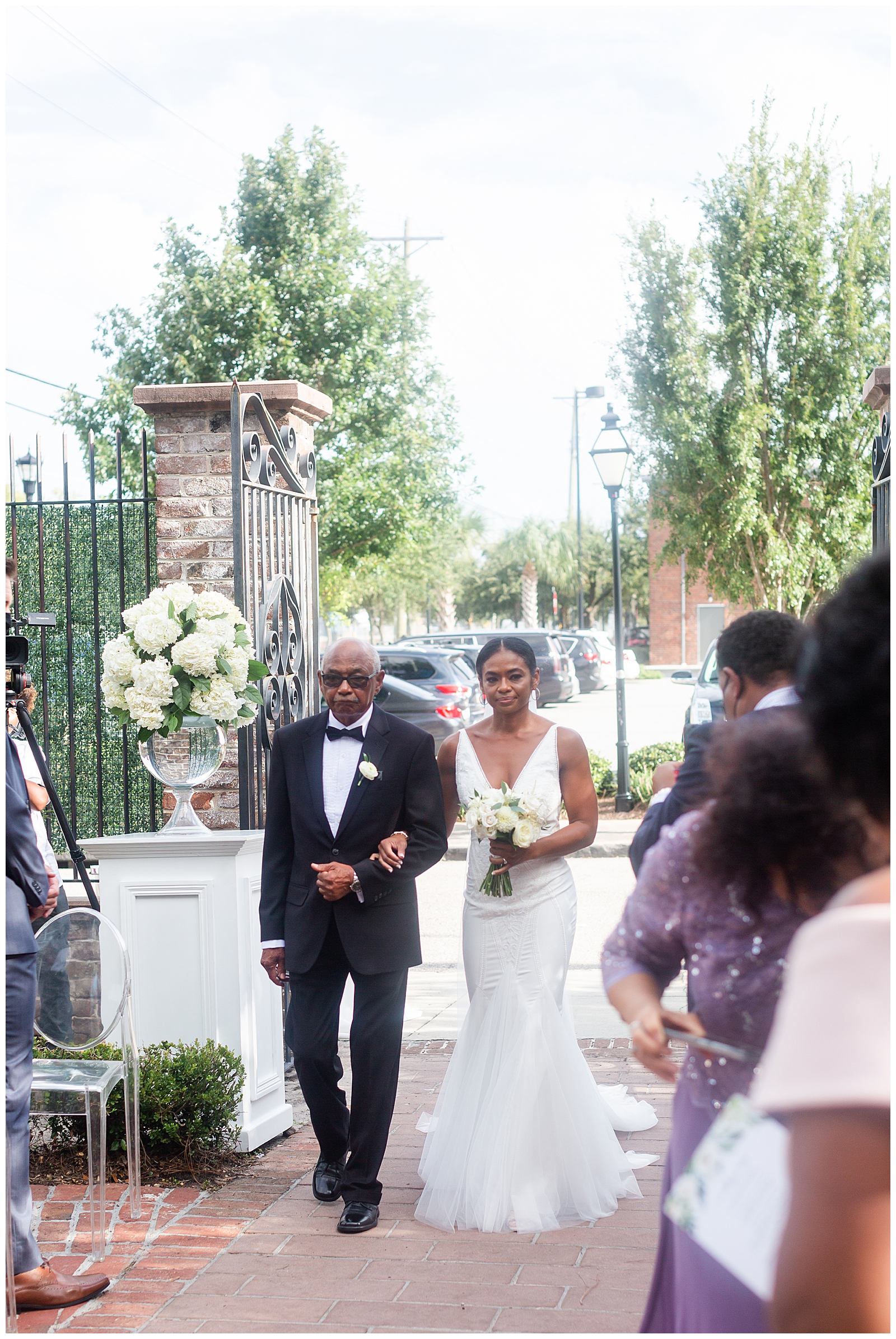 bride and dad walking down the aisle charleston