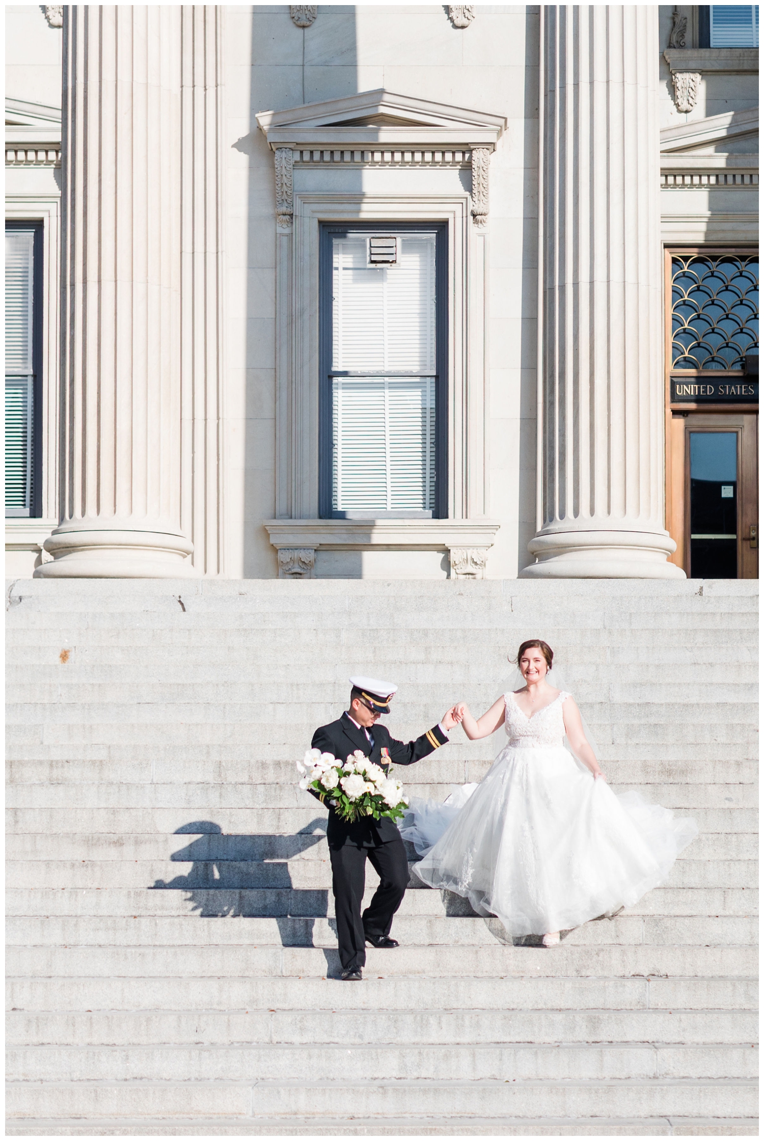 bride and groom portrait on the steps of Common House in Charleston