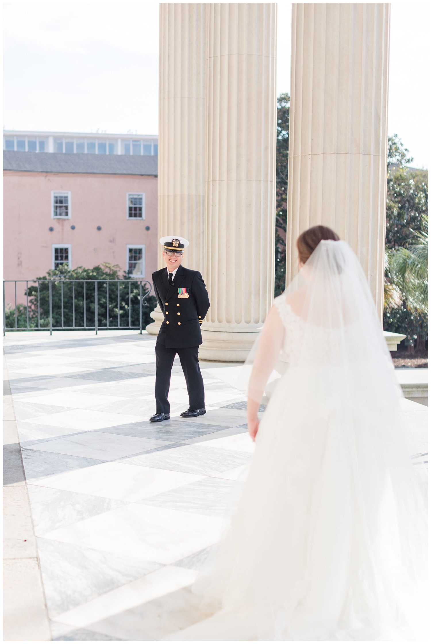 bride groom first look on steps of Custom House Charleston micro wedding