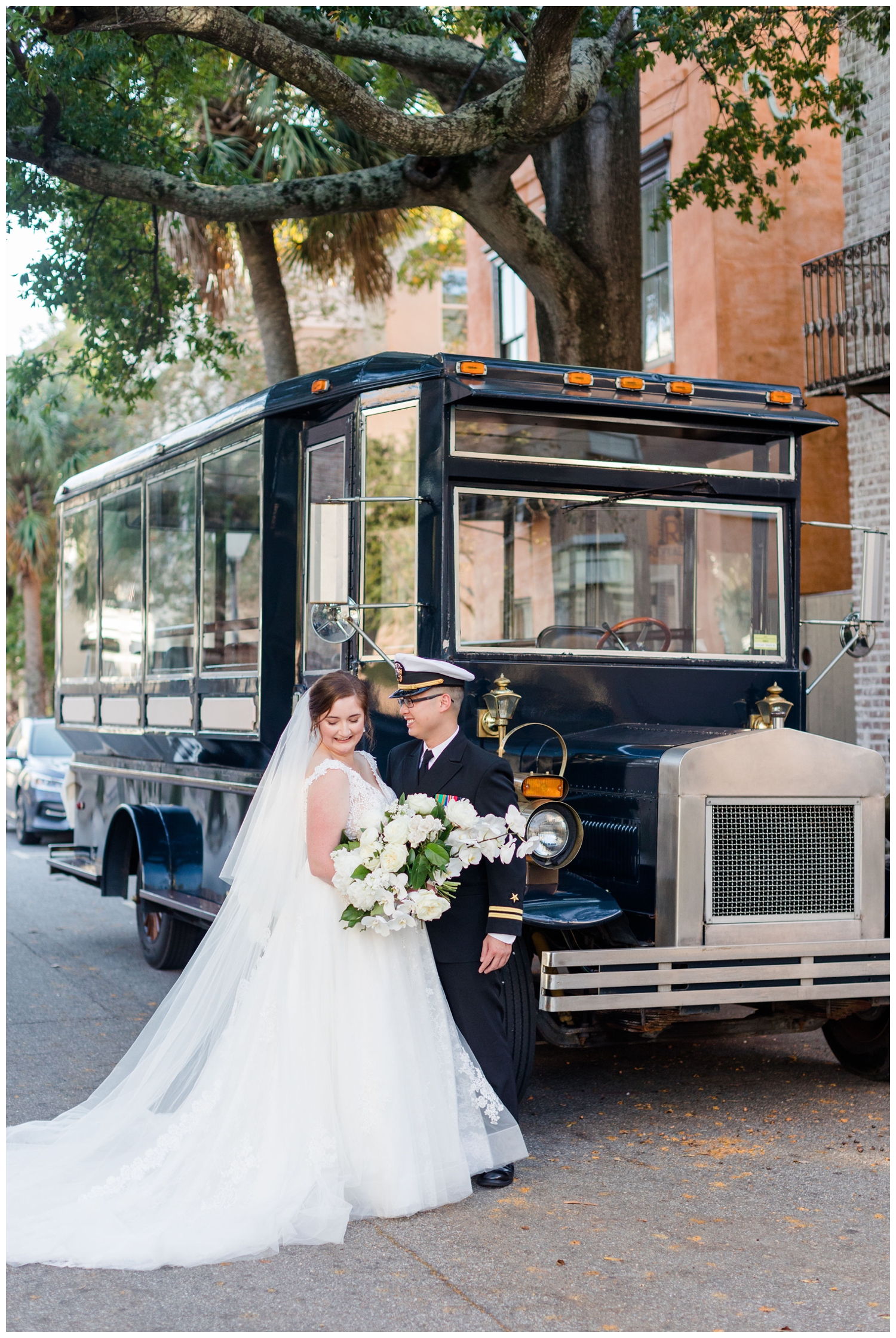 bride and groom portraits in front of Trolly in Charleston, South Carolina