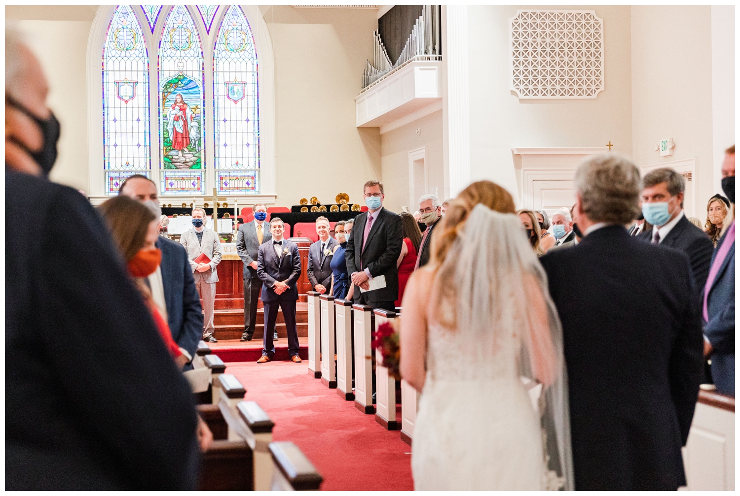 bride and father walking down the aisle for a colorful fall Charleston wedding at John Wesley United Methodist Church