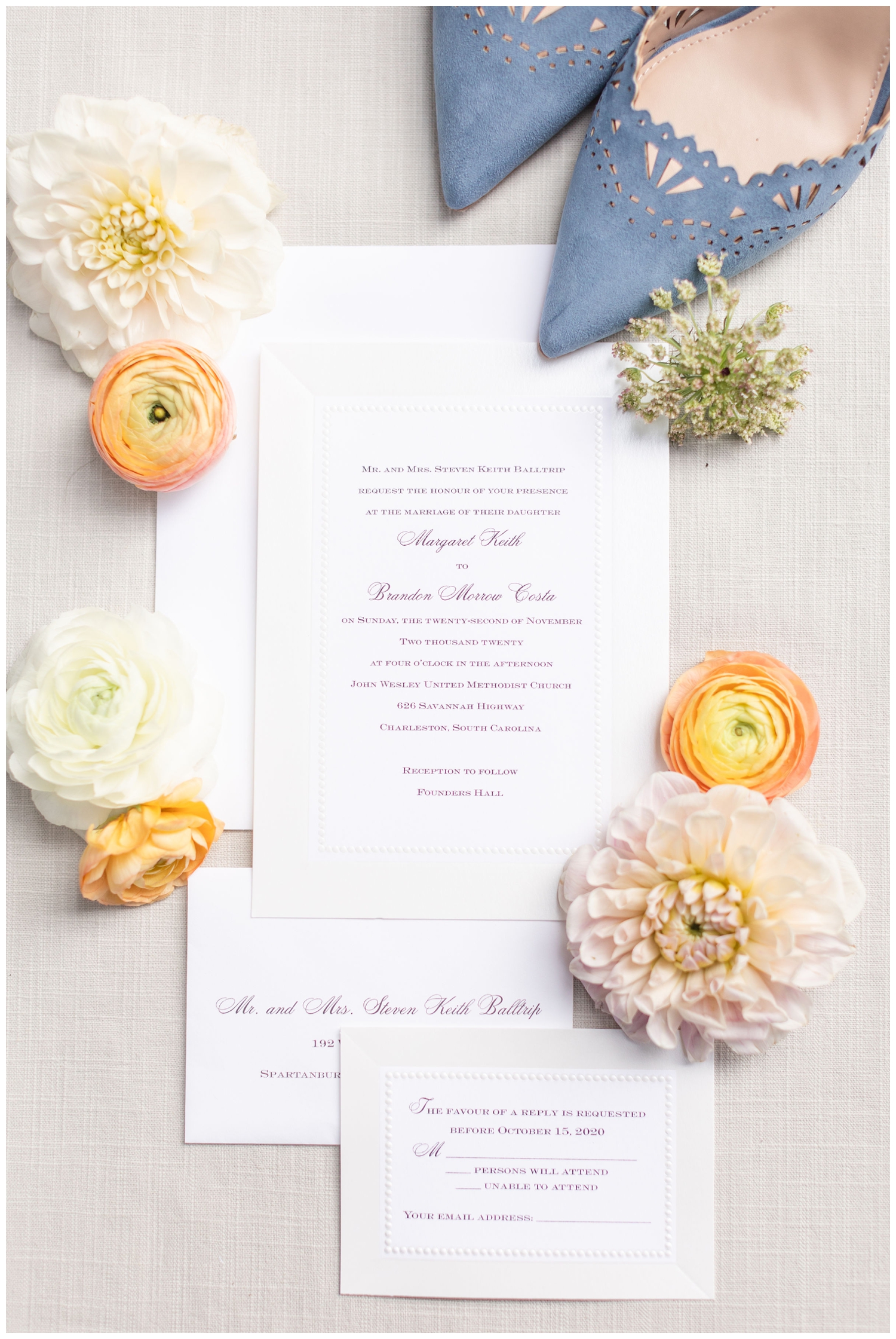 white invitation suite with colorful florals