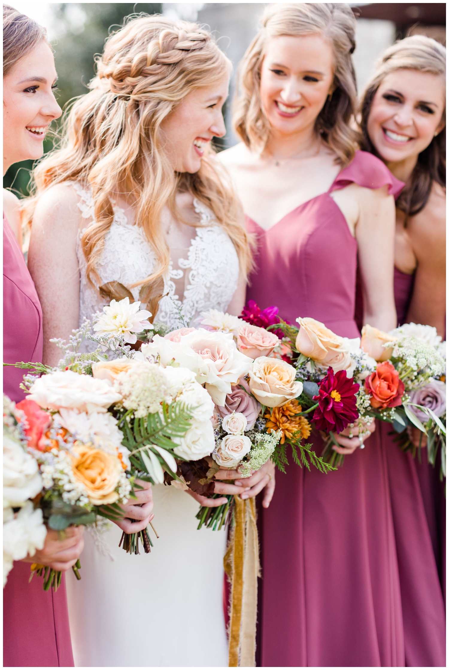 colorful bouquets with bride and bridesmaids