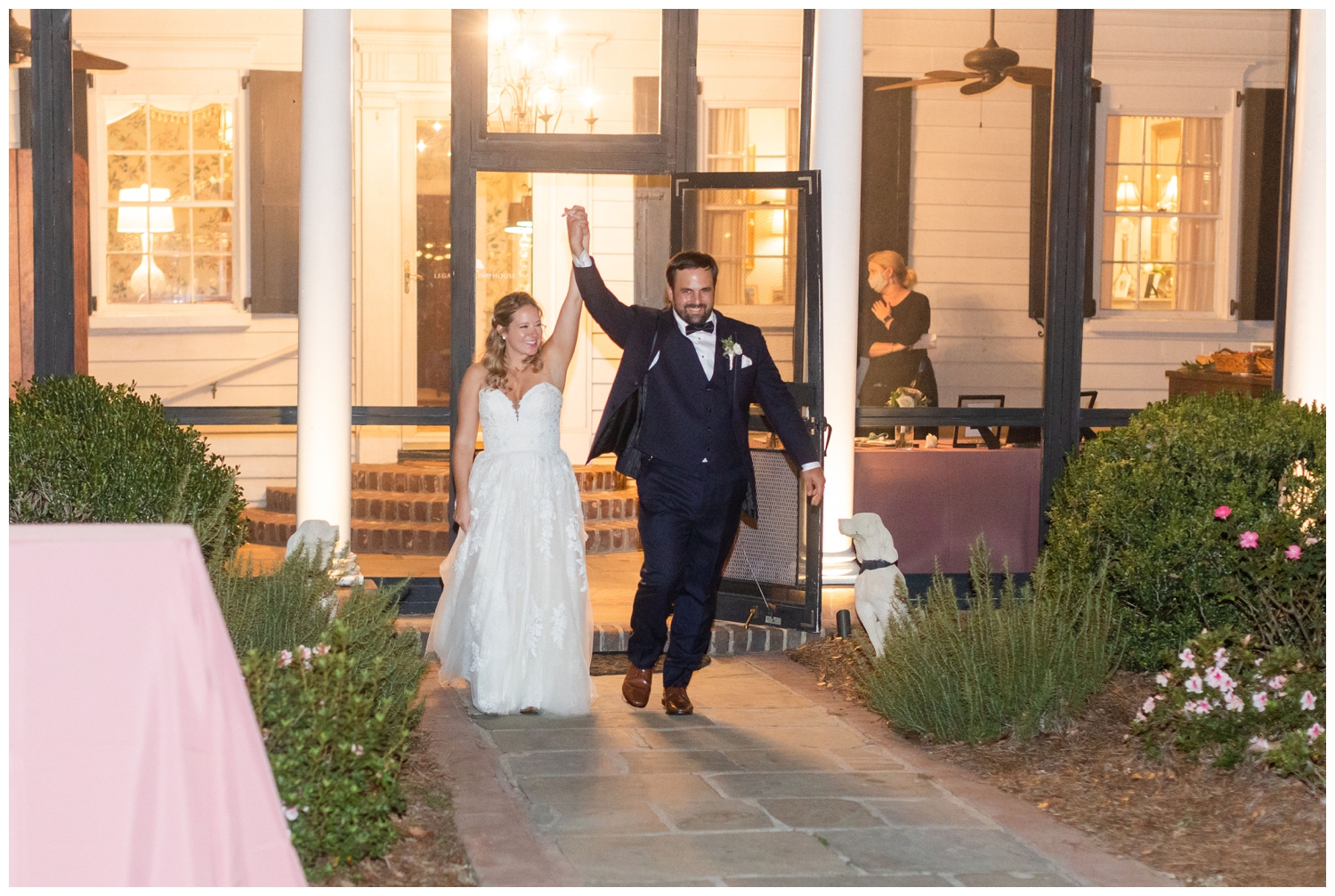 bride and groom entering reception at Legare Waring House