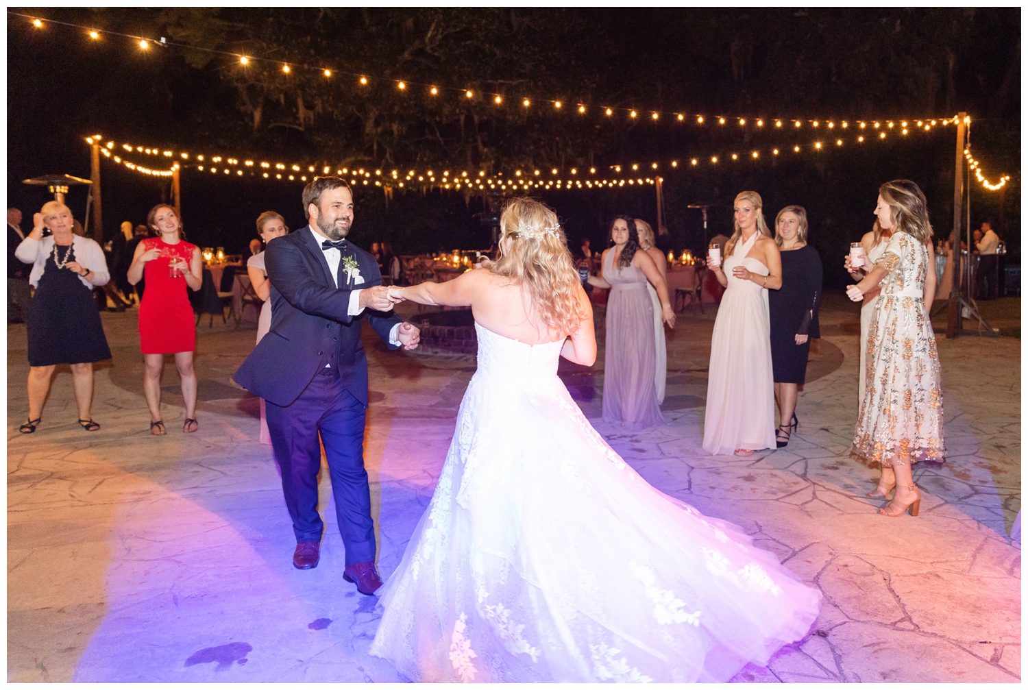 groom twirling bride during first dance at Legare Waring House