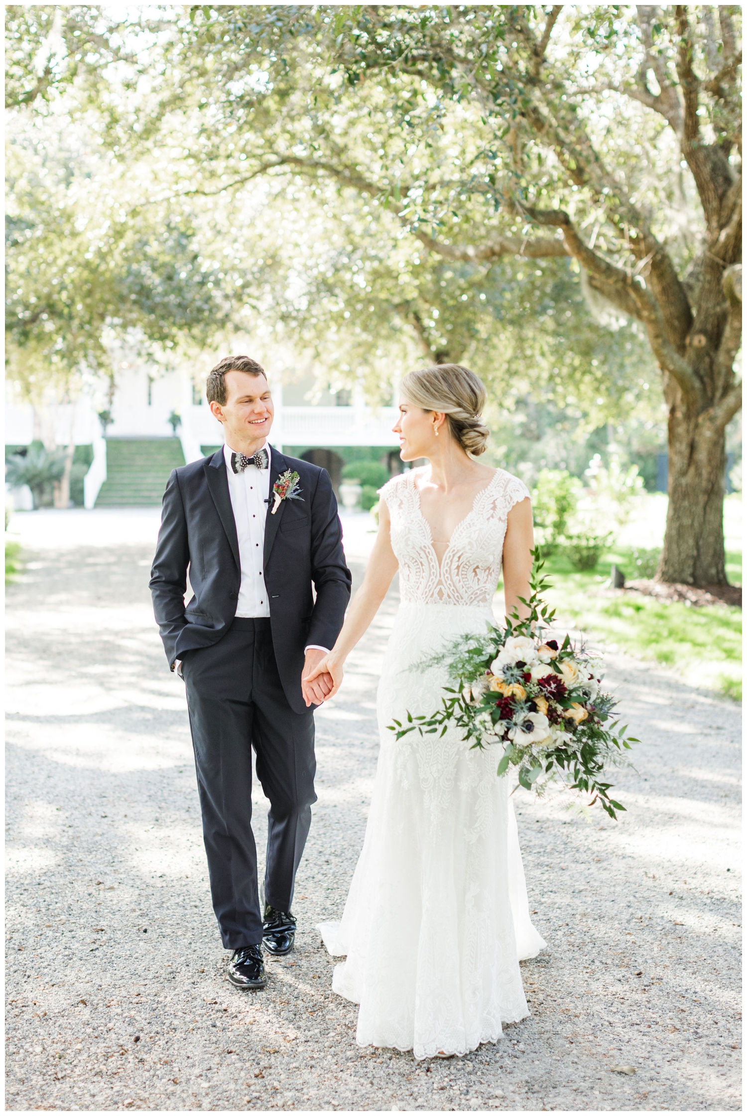 bride and groom walking at Old Wide Awake in Charleston, South Carolina