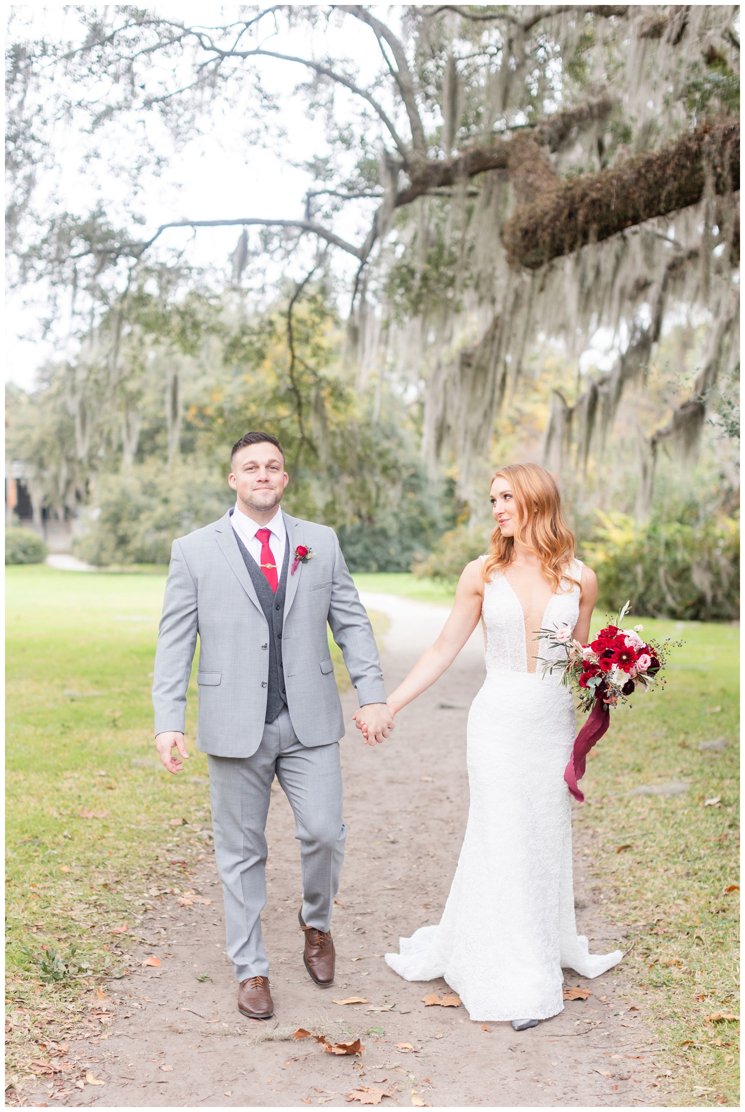 bride and groom holding hands walking for intimate Charleston winter elopement at Magnolia Plantation and Gardens
