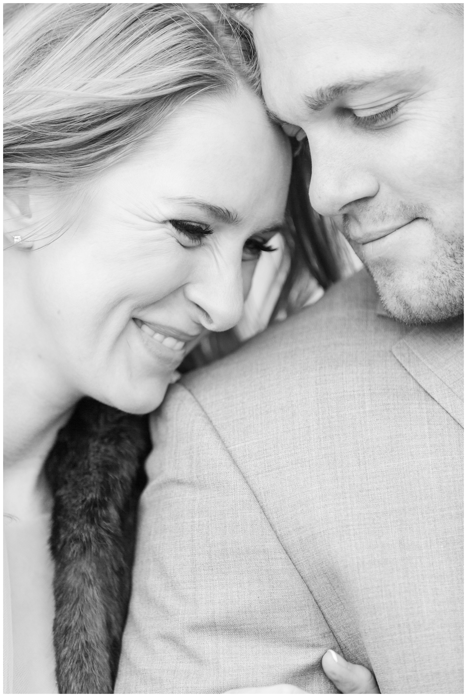 black and white portrait bride and groom smiling