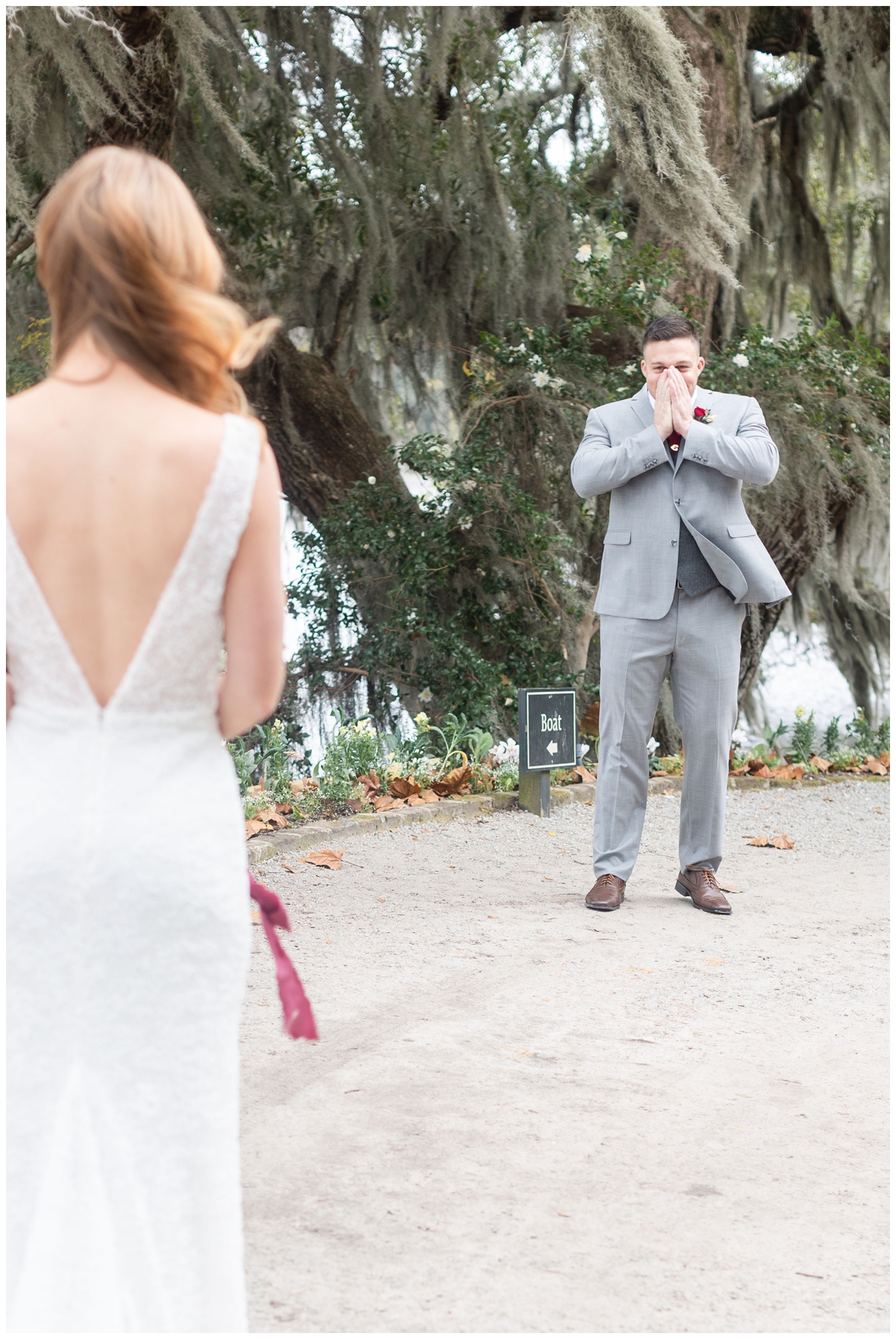 groom reacting during a first look with his bride at intimate Charleston winter elopement