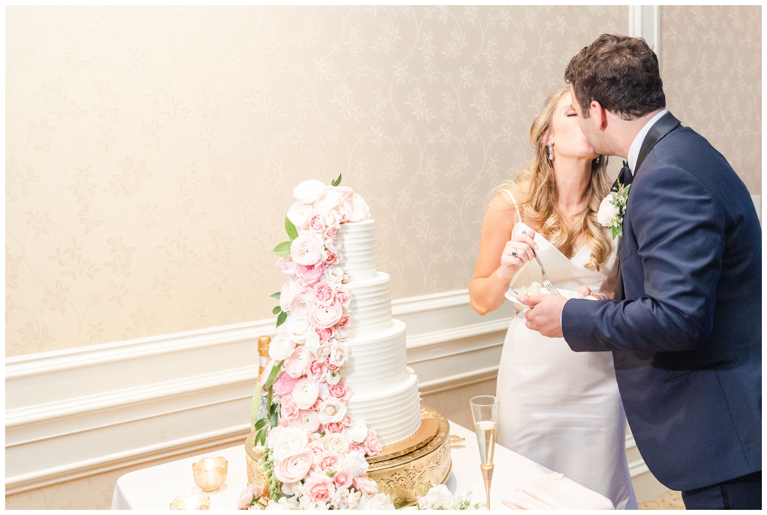 bride and groom cutting cake at at Sea Pines Resort wedding venue