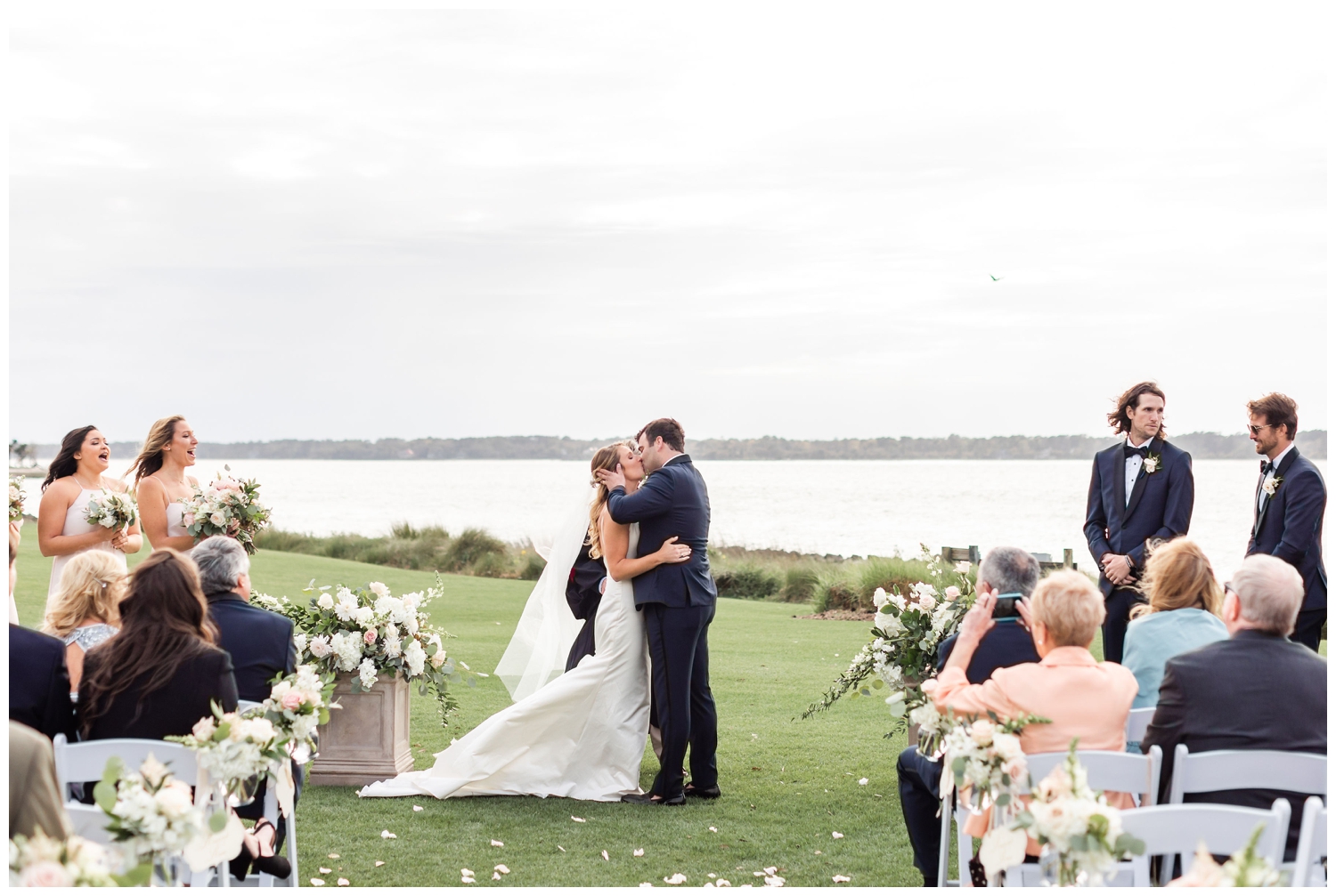 bride and groom kissing during ceremony Sea Pines Resort wedding