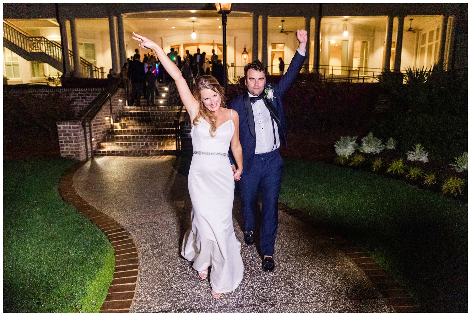 newlyweds celebrating as they exit wedding reception at Sea Pines Resort in Hilton Head