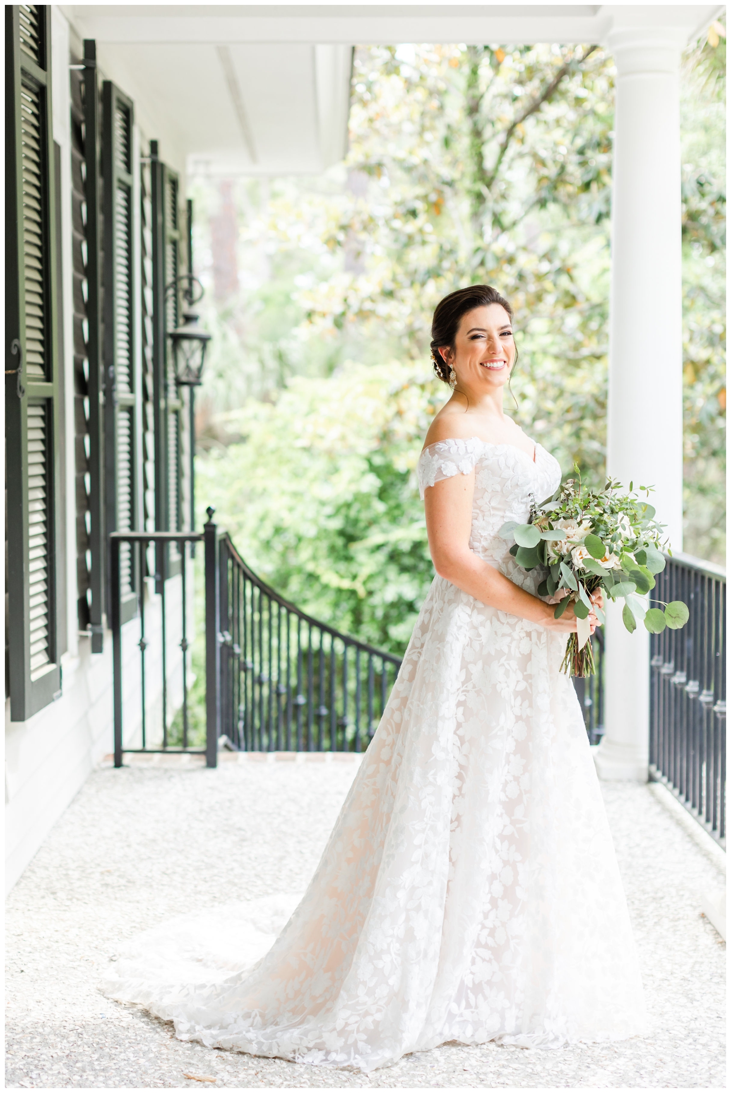 bridal portrait with white bouquet on porch at intimate Hilton Head wedding