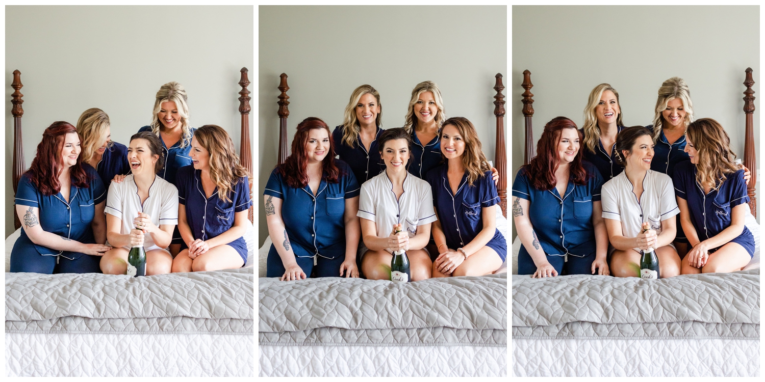 bride and bridesmaids in matching pajamas with champagne at intimate Hilton Head wedding