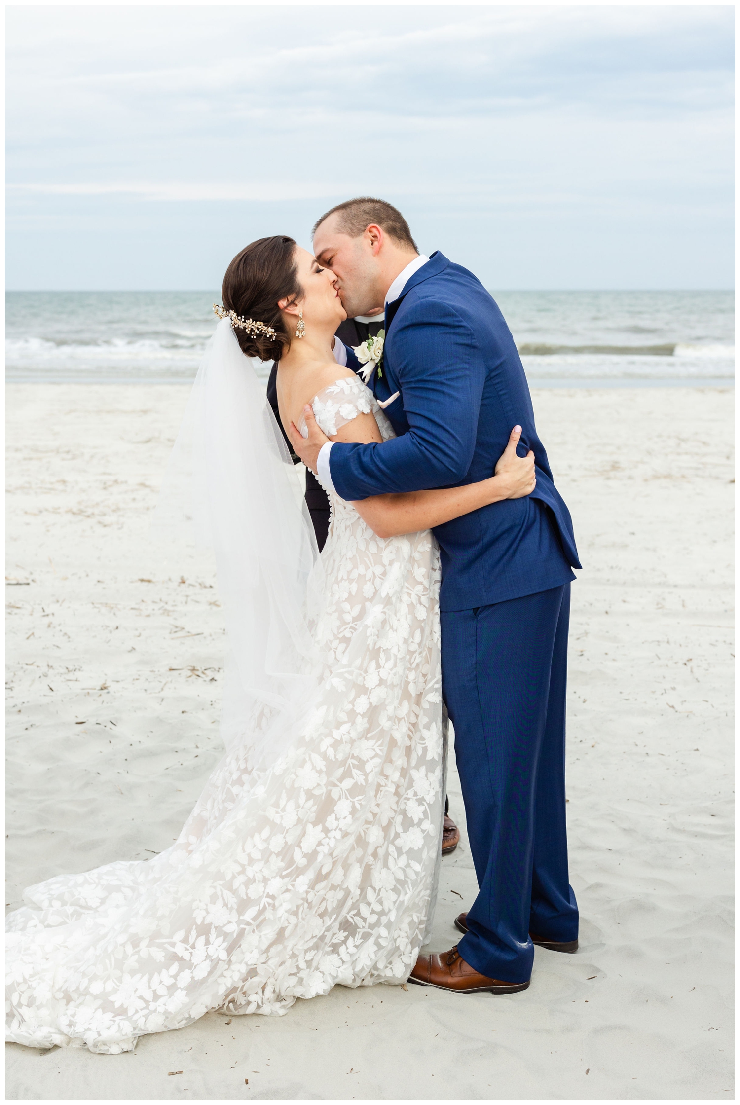 first kiss as newlyweds on the beach at Hilton Head
