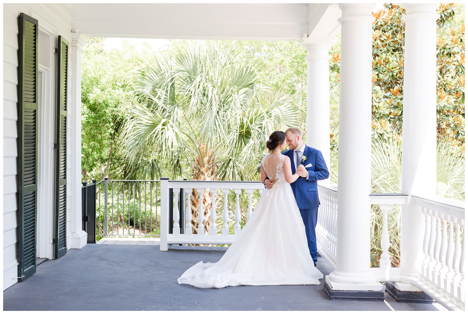 bride and groom dancing on porch at spring Lowndes Grove wedding