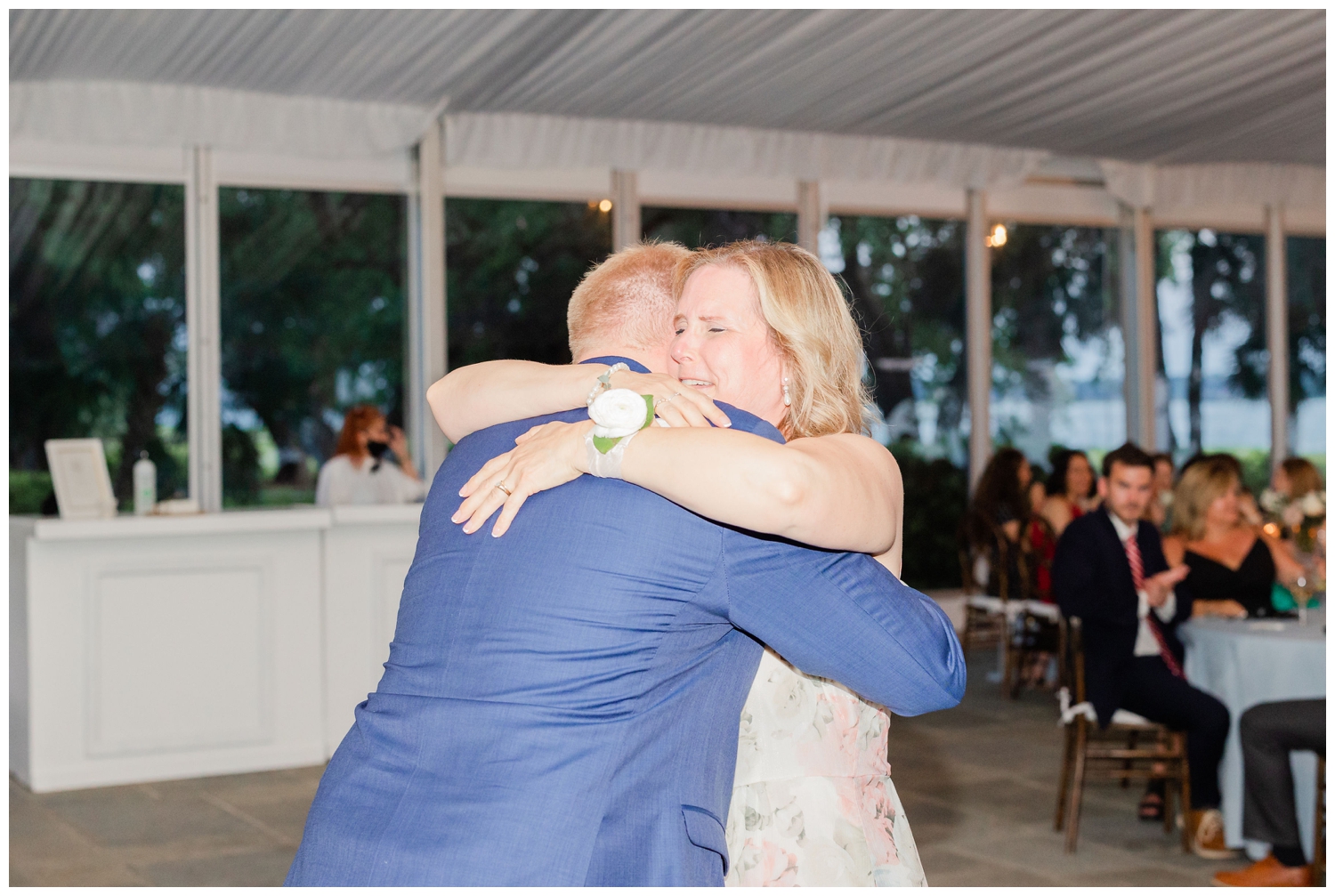 mother and groom hugging on dance floor