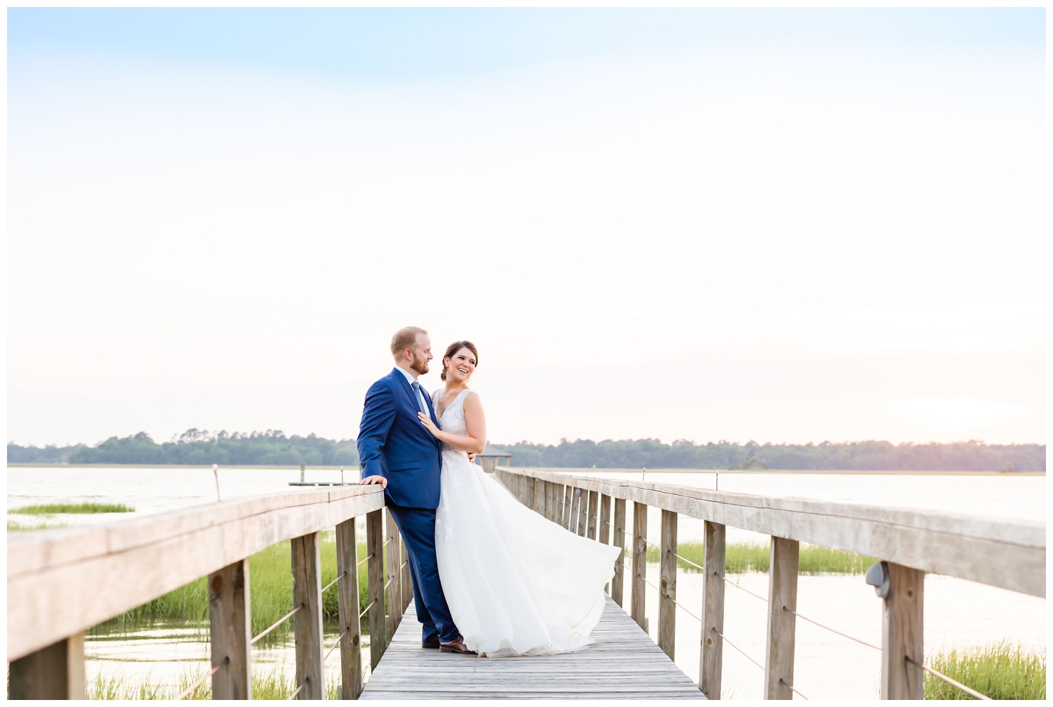 bride and groom sunset photo on the pier at Lowndes Grove in Charleston