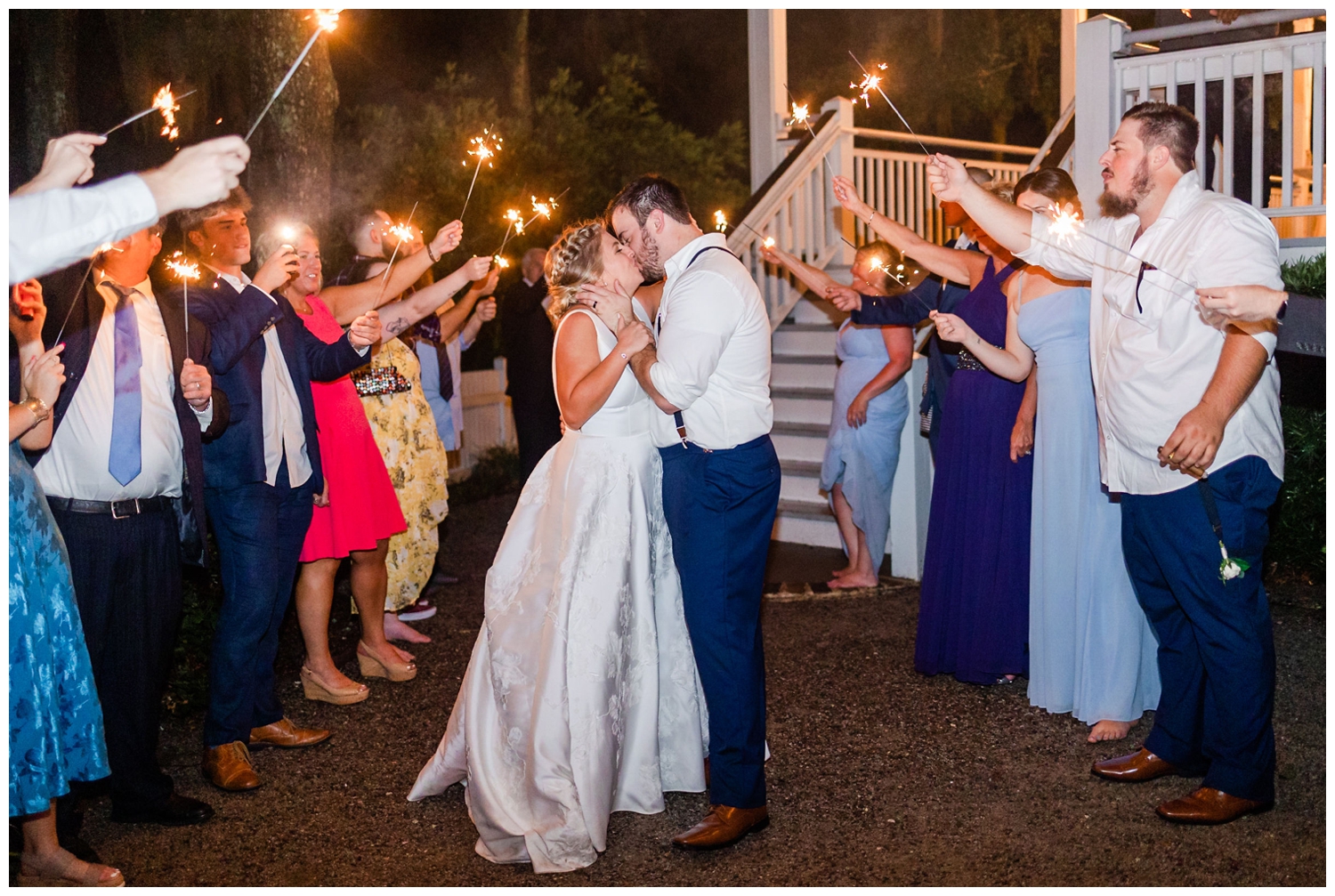 bride groom kissing during sparkler exit at summer Creek Club at I'on wedding