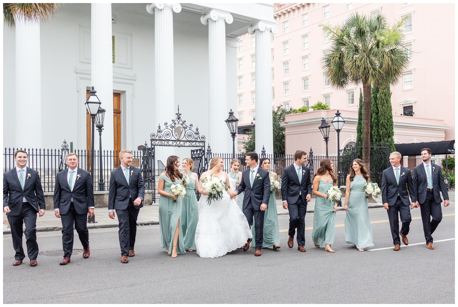 bridal party walking Charleston Merchants Hall Reception
