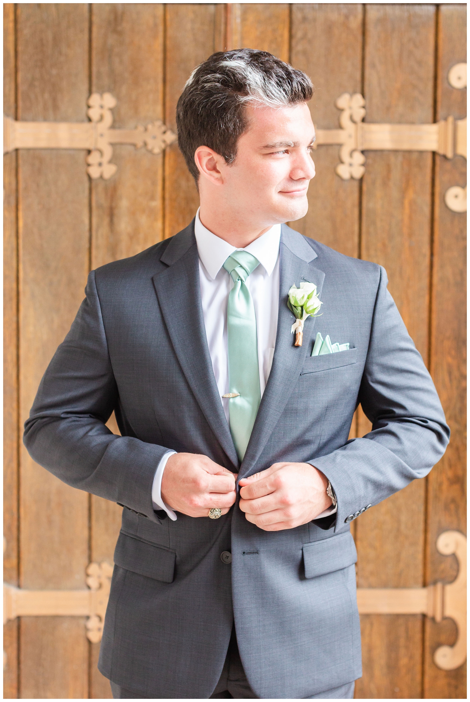 groom in a gray suite