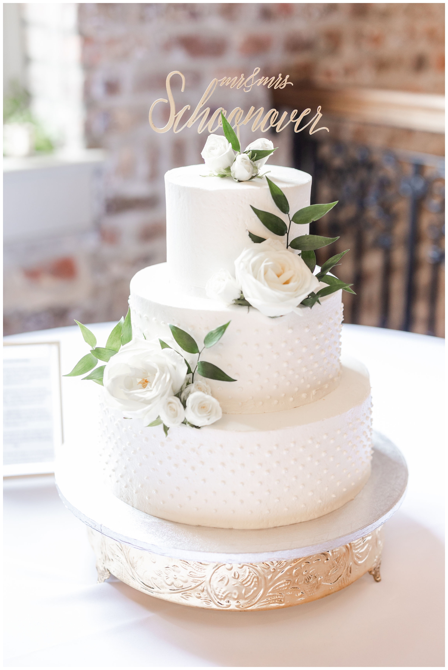 tiered all white cake with white roses Charleston Merchants Hall Reception