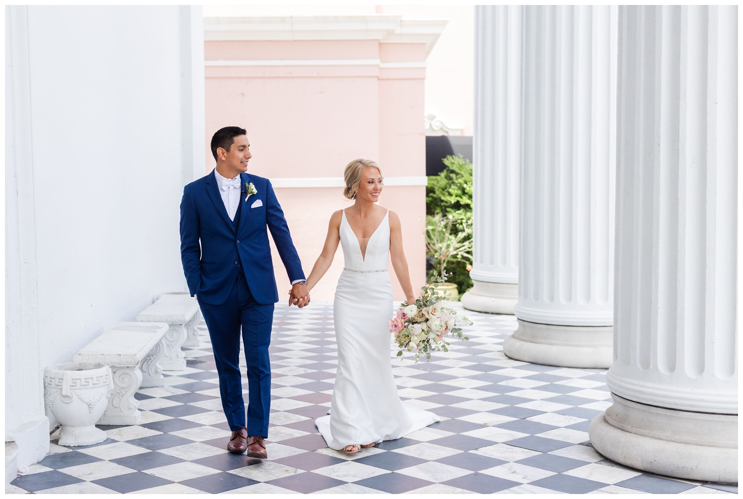 bride and groom walking portraits for southern summer wedding Charleston