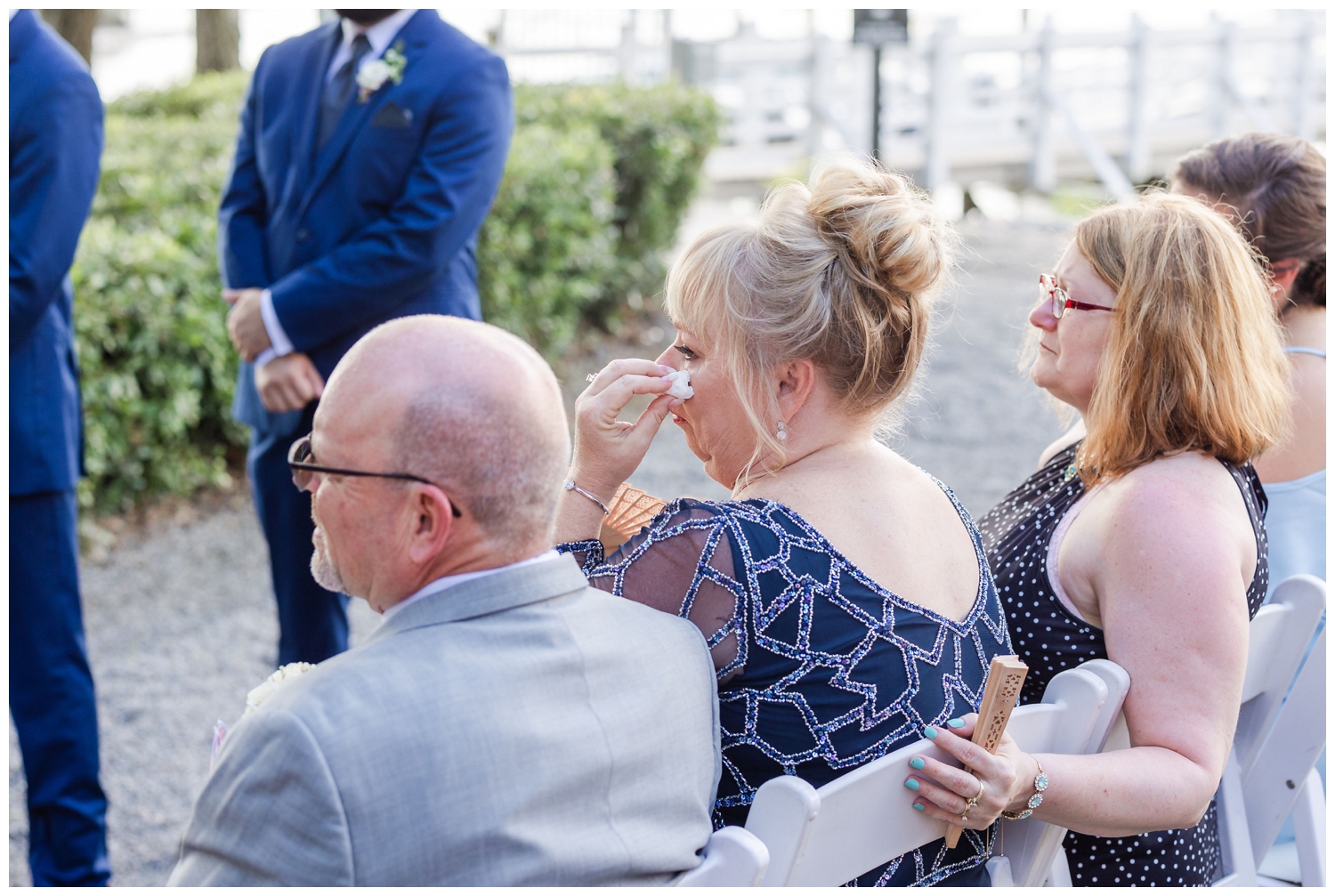 mother of bride crying at southern summer wedding Charleston ceremony
