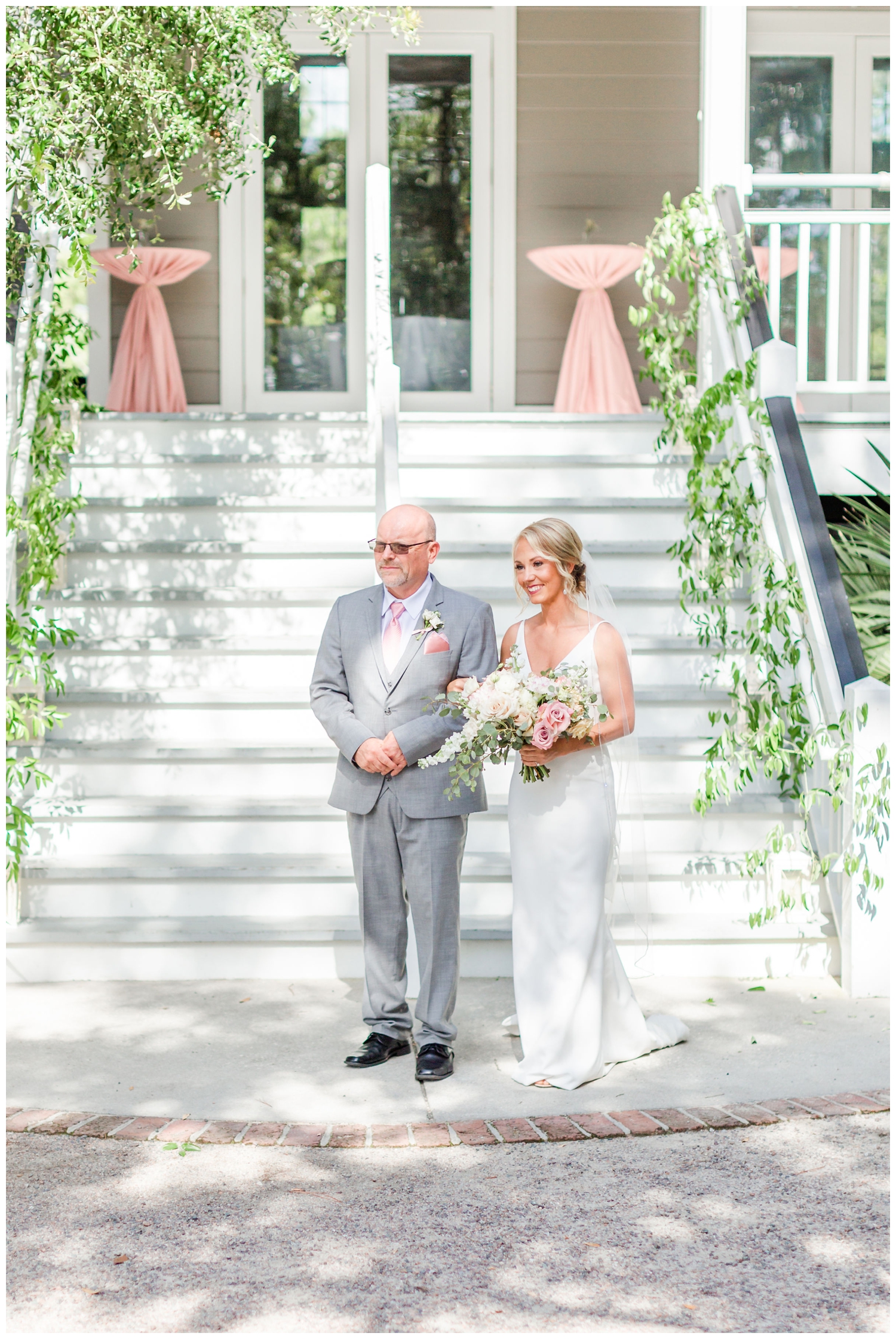 father and bride ceremony entrance at Creek Club I'On southern summer wedding Charleston