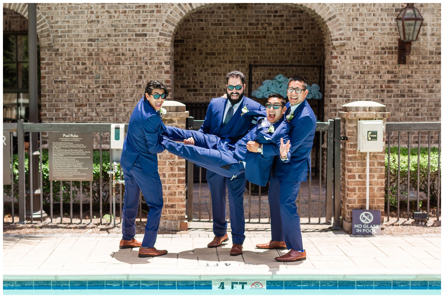 groom and groomsmen outside a southern summer wedding in Charleston South Carolina