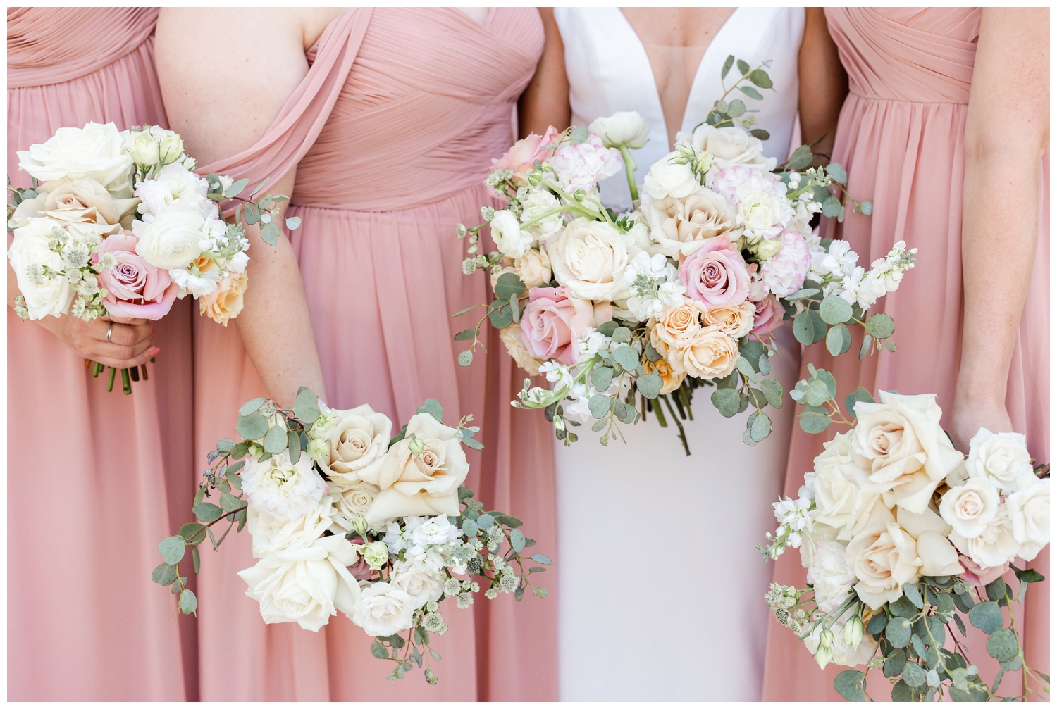 bridesmaid and bride bouquets white pink and peach