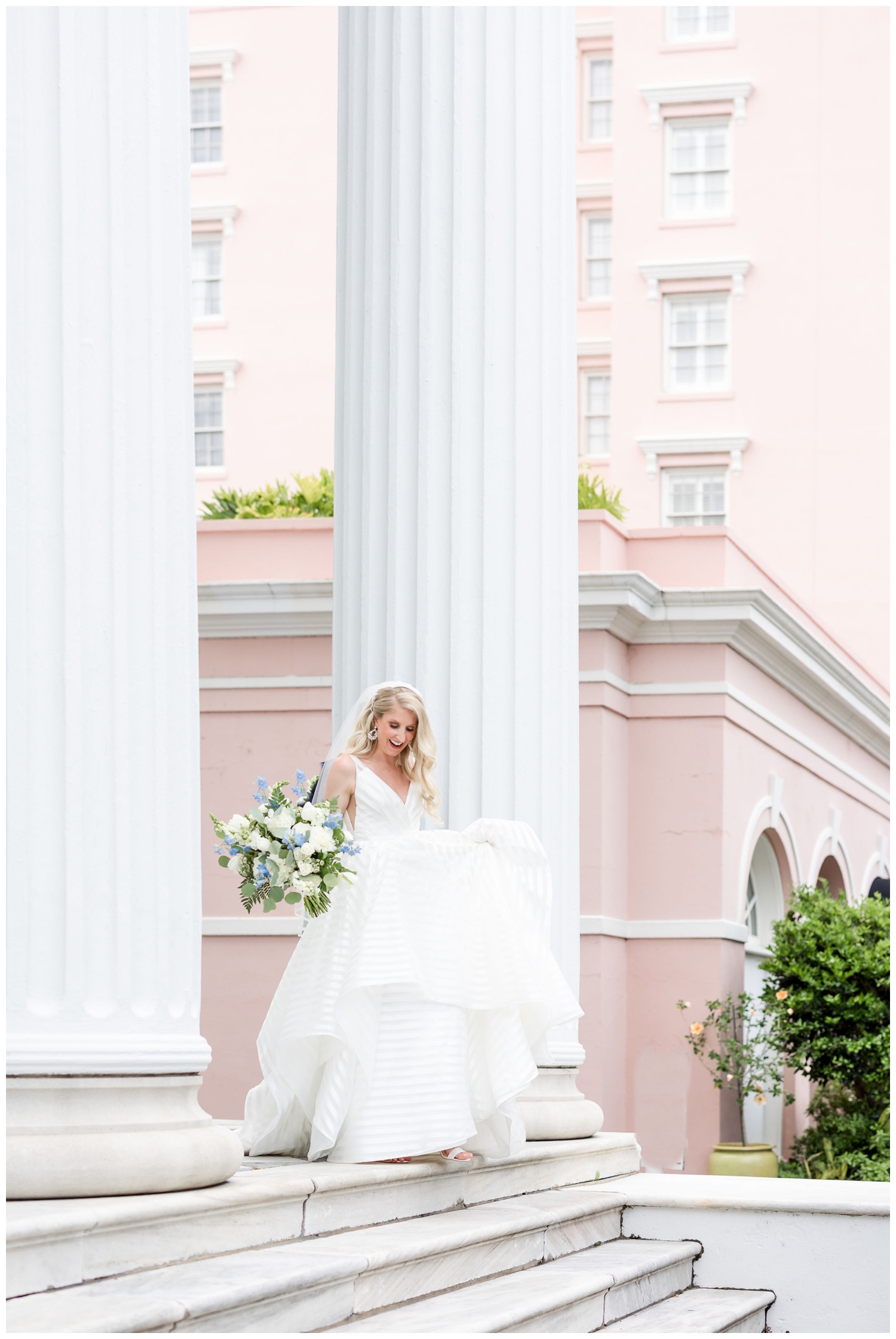 bride walking down steps at Hibernian Hall to luxury Cedar Room wedding