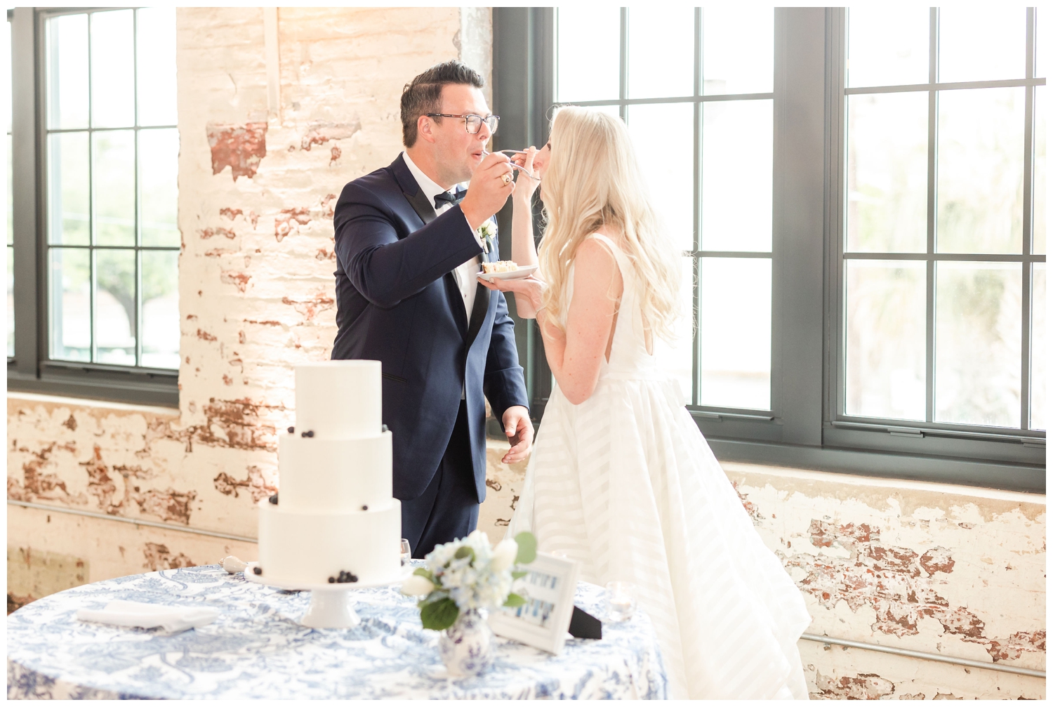 bride and groom cake cutting Cedar Room