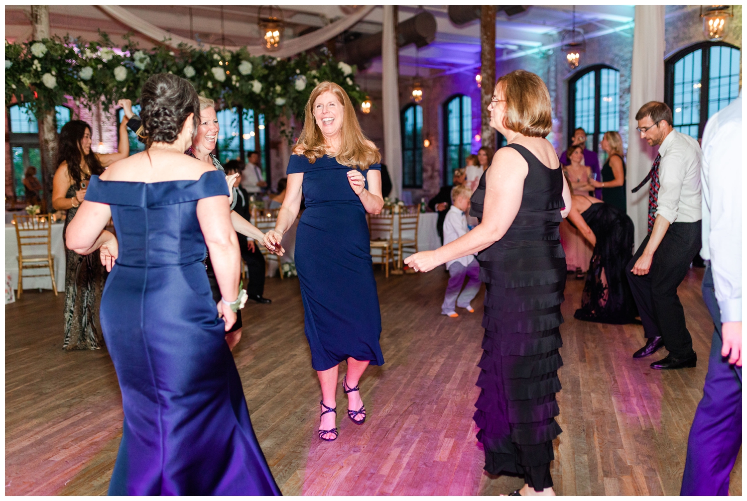 luxury Cedar Room wedding guest dancing